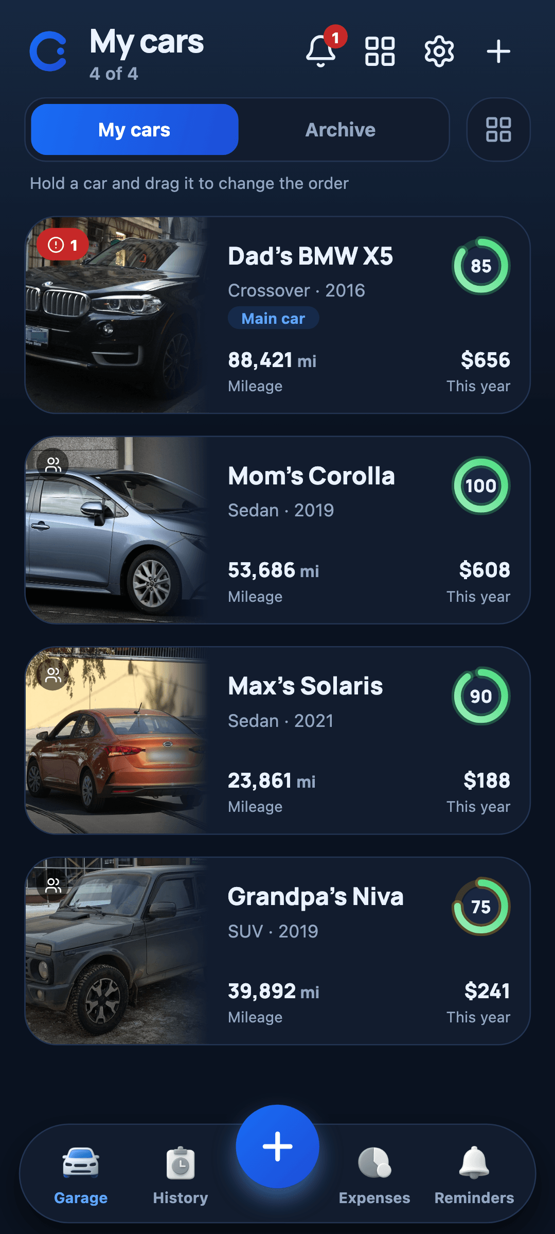 The Garagio home screen with a garage of cars, mileage and yearly spending